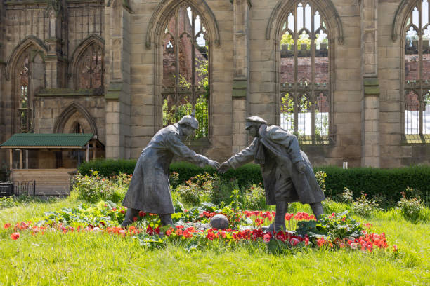 A sculpture in Liverpool., England called All Together Now depicts to enemy soldiers shaking hands while standing over a soccer ball.