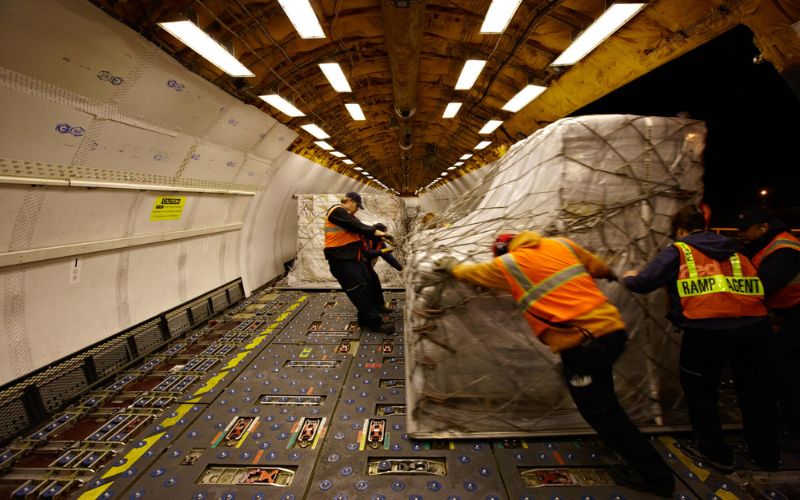 Emergencies aid supplies being loaded onto a plane