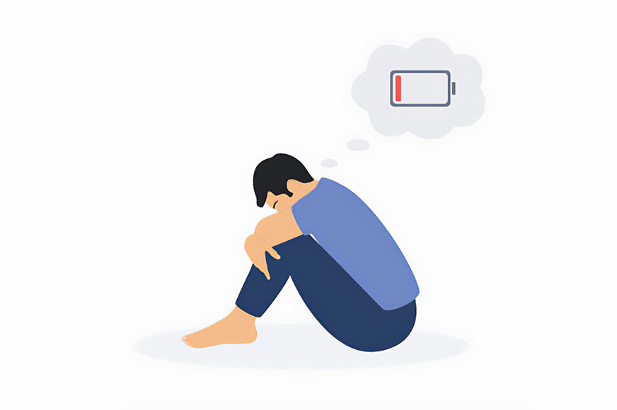 llustration of a man sitting down cradling his knees with his emotional battery drained.