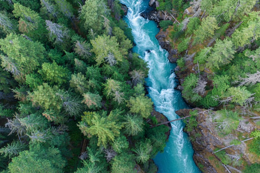 Clean water flowing through a river in western Canada