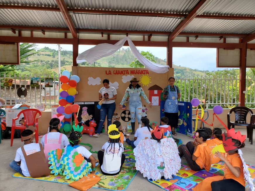 In Nicaragua, children and adults in colourful costumes participate in a skit.