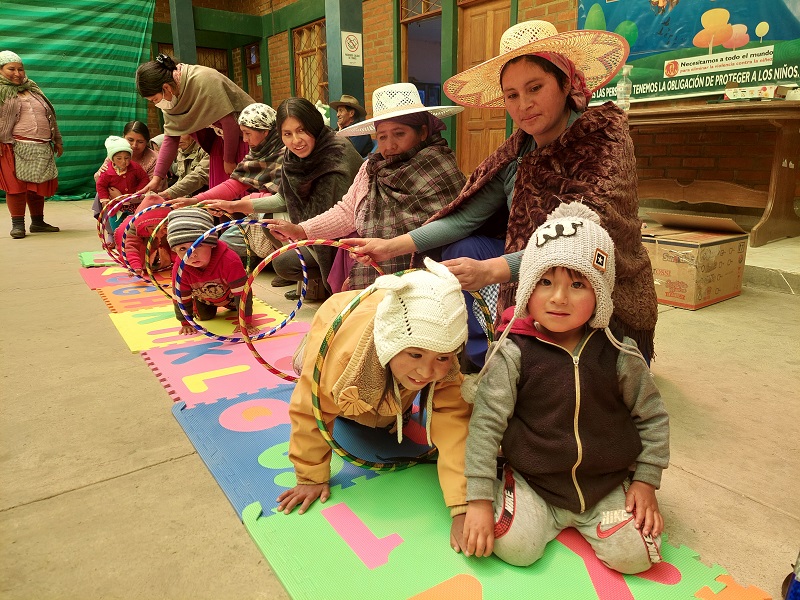 A group of toddlers participate in play-based learned in Koari, Bolivia.