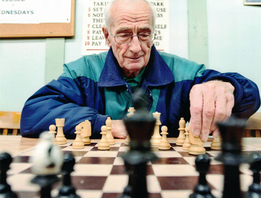 legacy-giving-arie-kamp-playing-chess