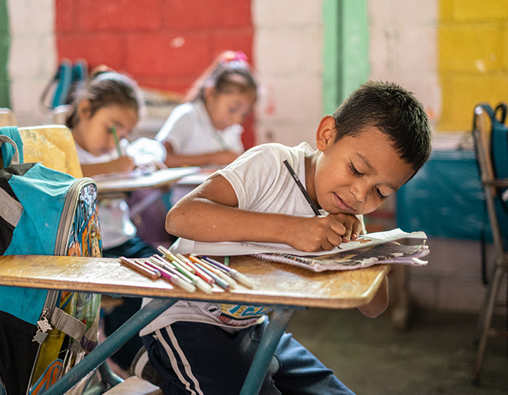 education-boy-drawing-on-a-paper.jpg
