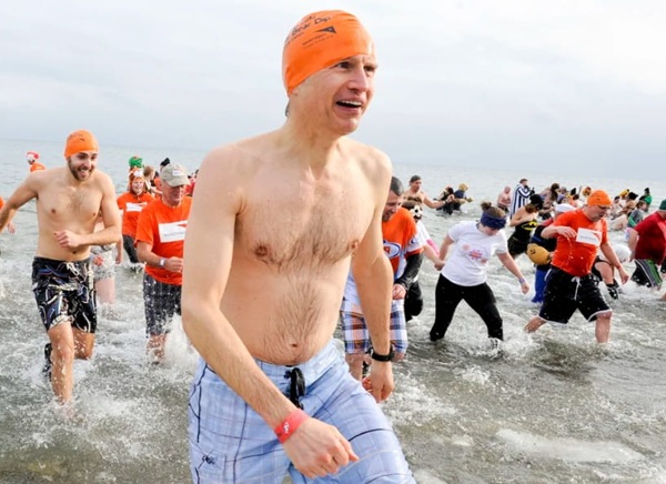 People participating in the annual Polar Bear Dip event.