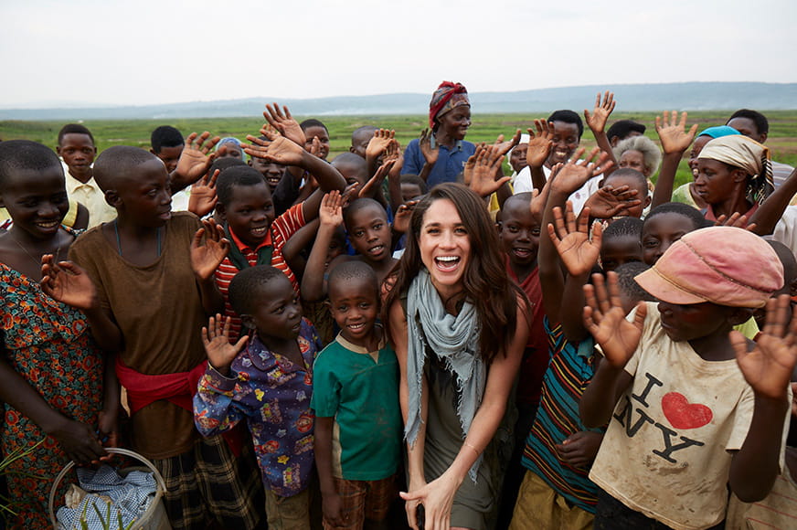 Meghan Markle smiling with children in Rwanda