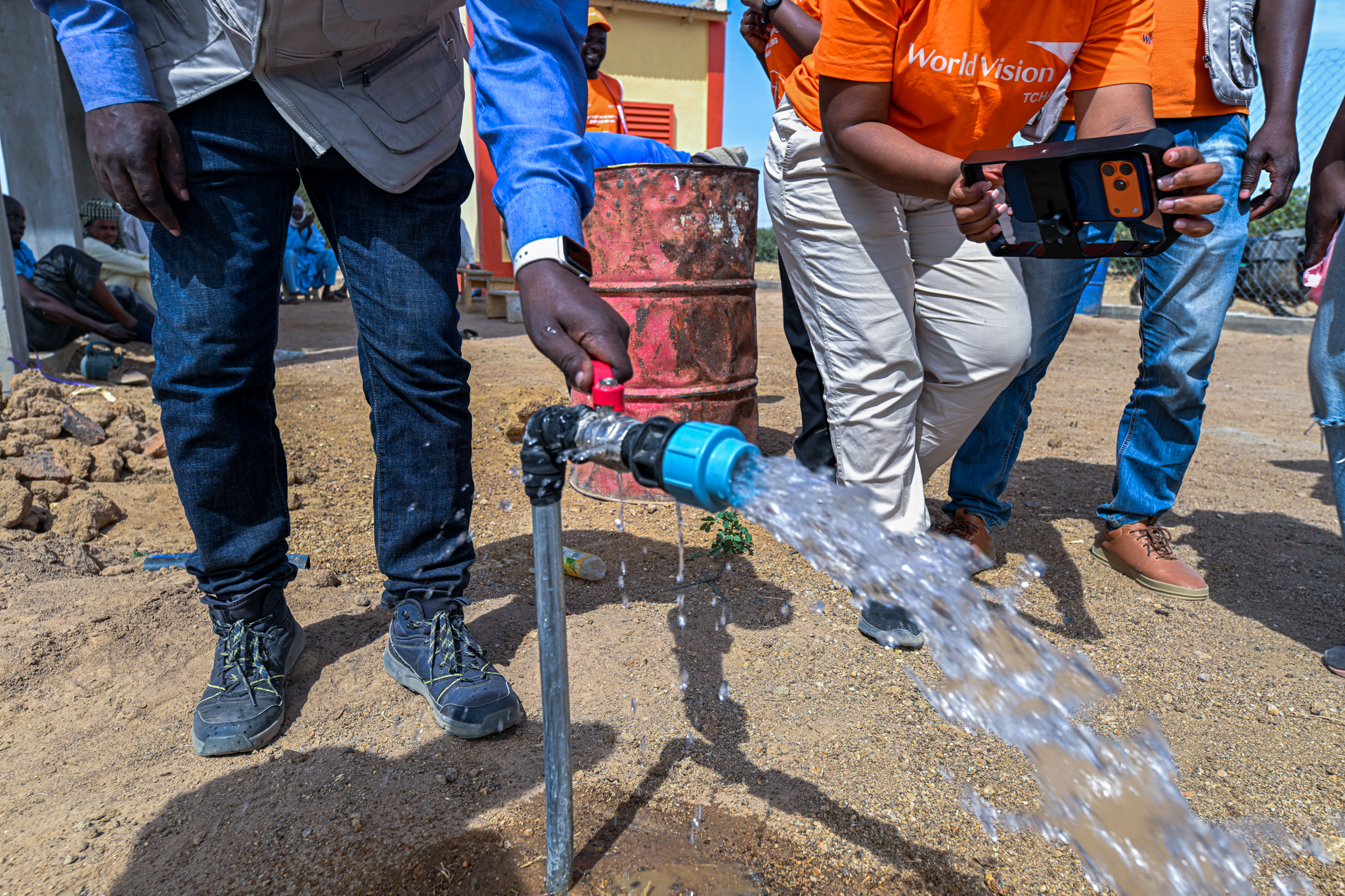 Clean water flowing from a tap.