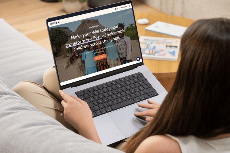 Image of a lady on a couch using the Epilogue Website for World Vision Canada.