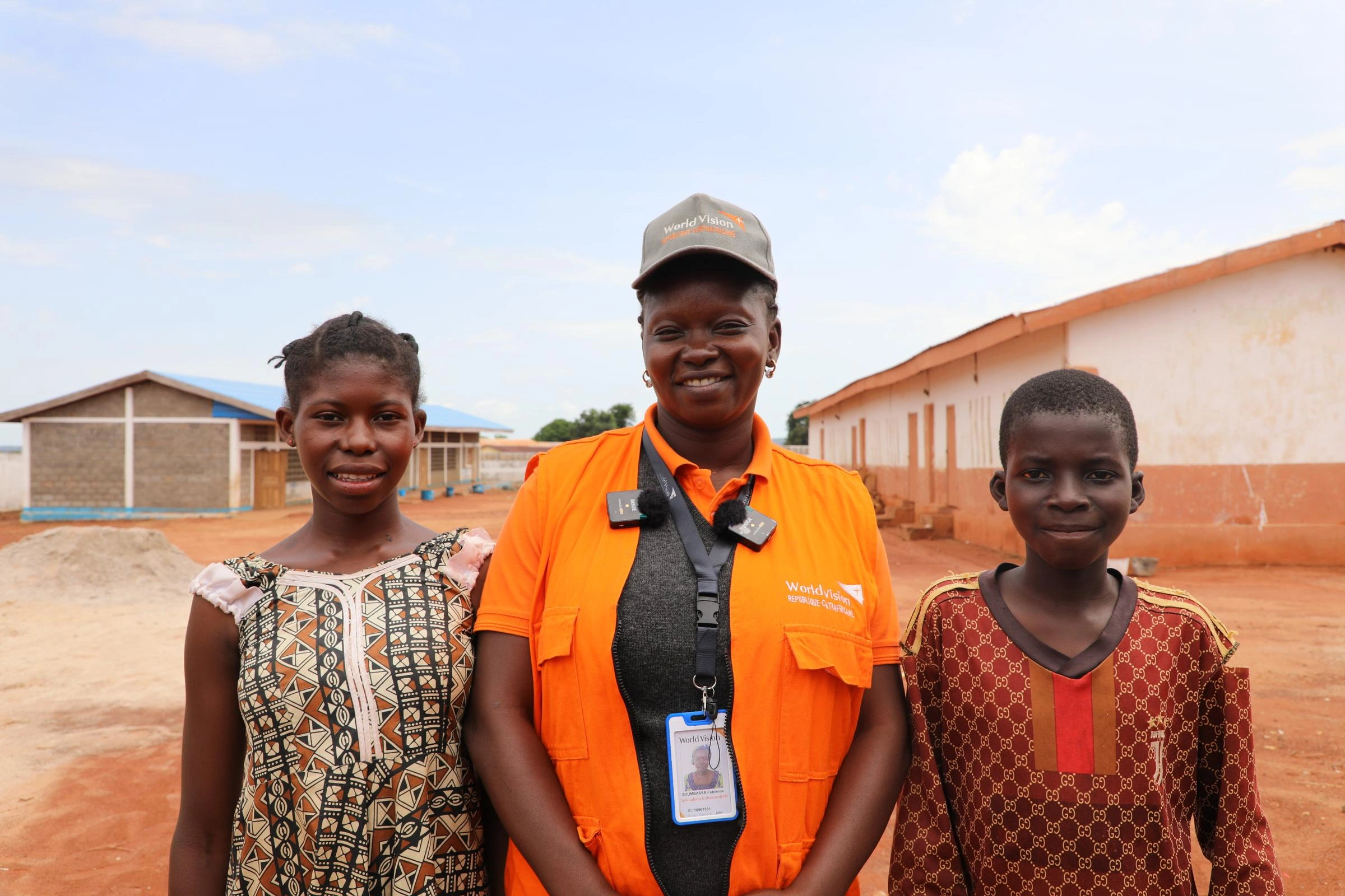 Image of Fabienne (WV Child Protection Specialist) with Richard and Viviane