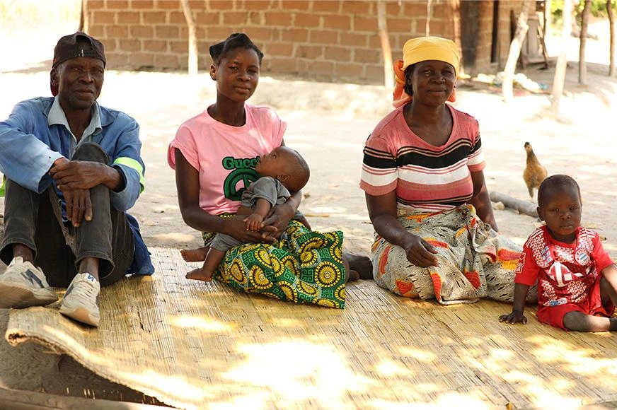 Guilhermina (centre) with her son, supportive parents Gabriel and Adelaide, and one of her six siblings.
