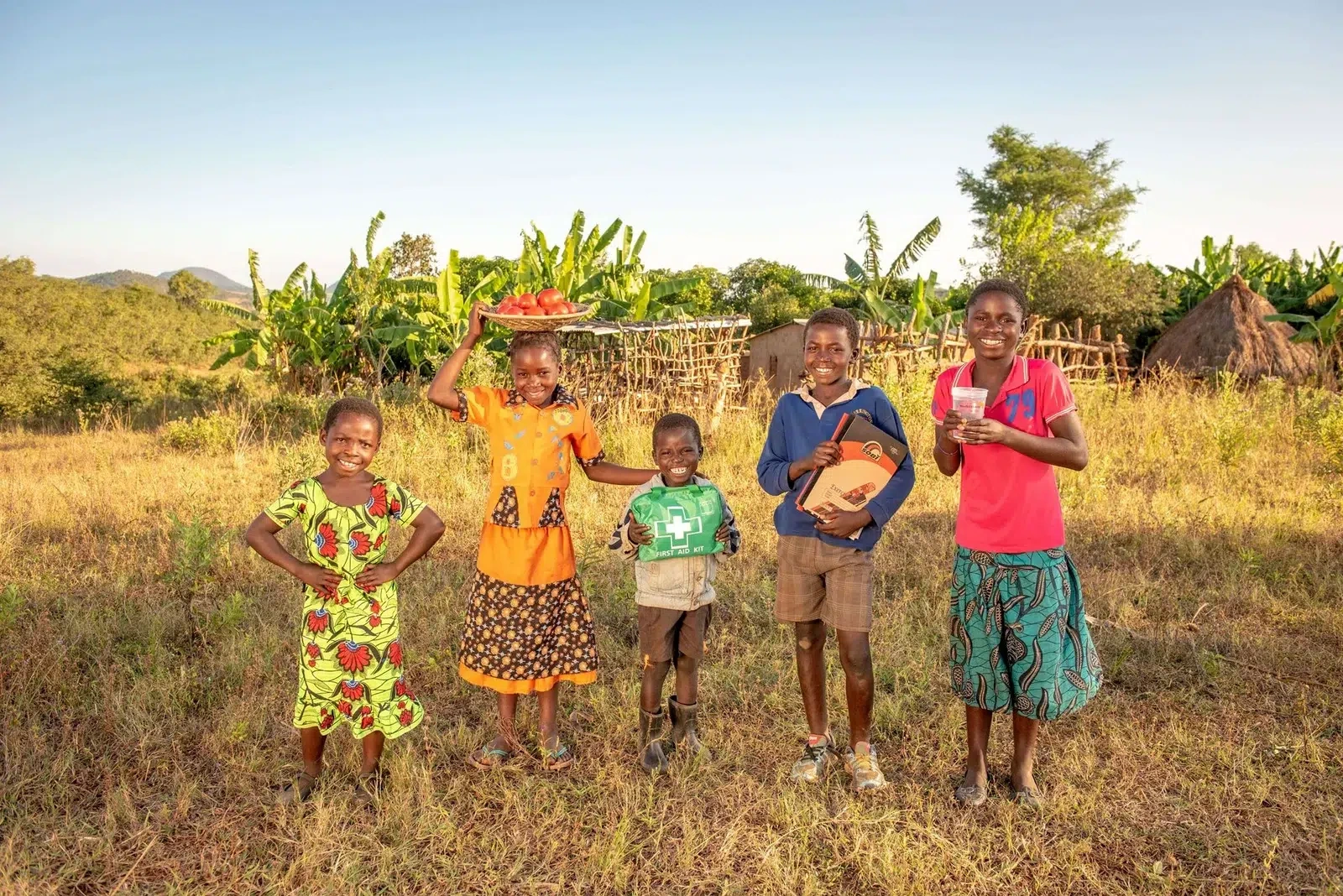 wvc-end-the-cycle-five-children-standing-in-a-field.webp
