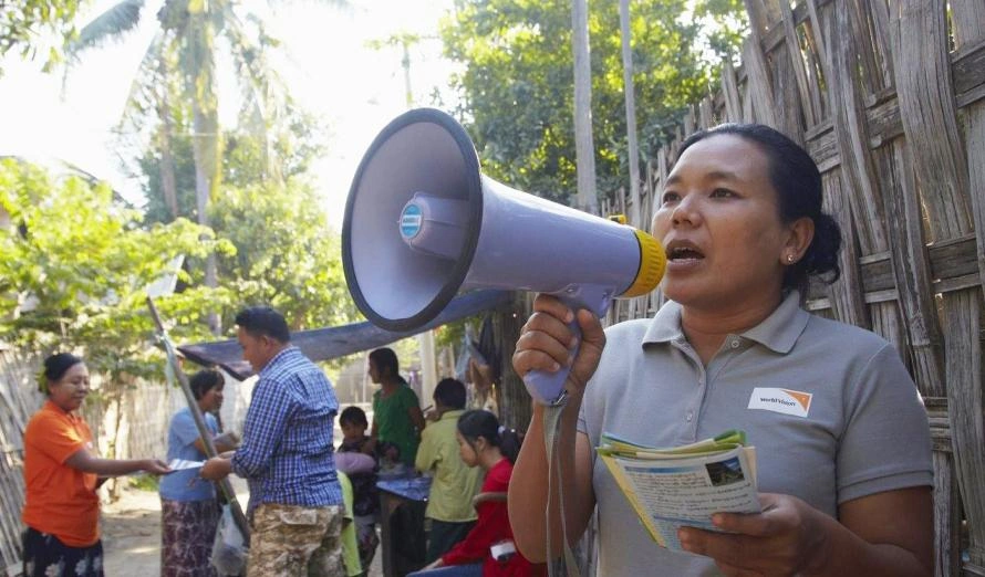 World Vision Staff speaking on loud speaker