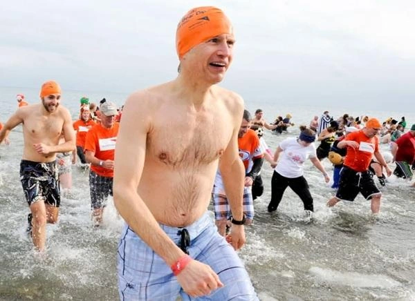 People participating in the annual Polar Bear Dip event.