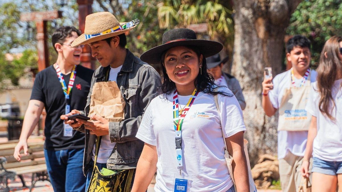Young attendee smiling during the Global Youth Summit.