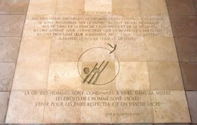 Looking down at the stone Father Joseph Wresinski laid down on October 17, 1987 to help combat poverty.