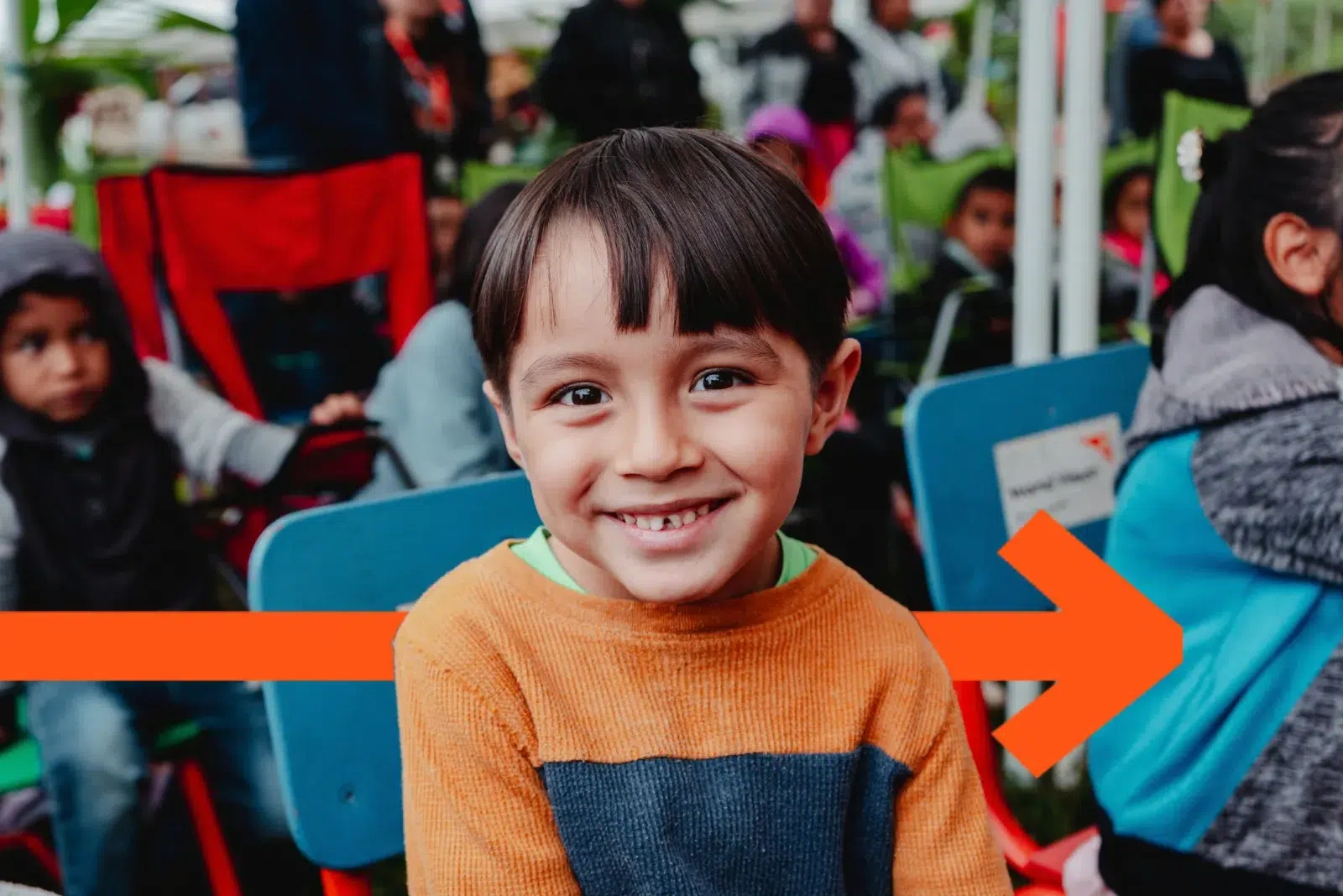 A young boy from Honduras smiles.