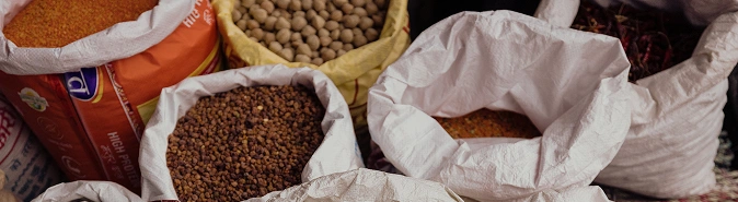 Opened bags of dried food items.